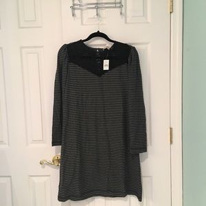 Long sleeve, just above the knee striped dress.